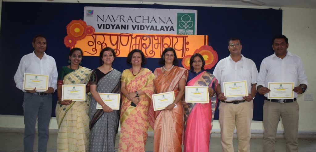 Fecilitation of staff members who completed a decade of dedicated service in  Navrachana Vidyani