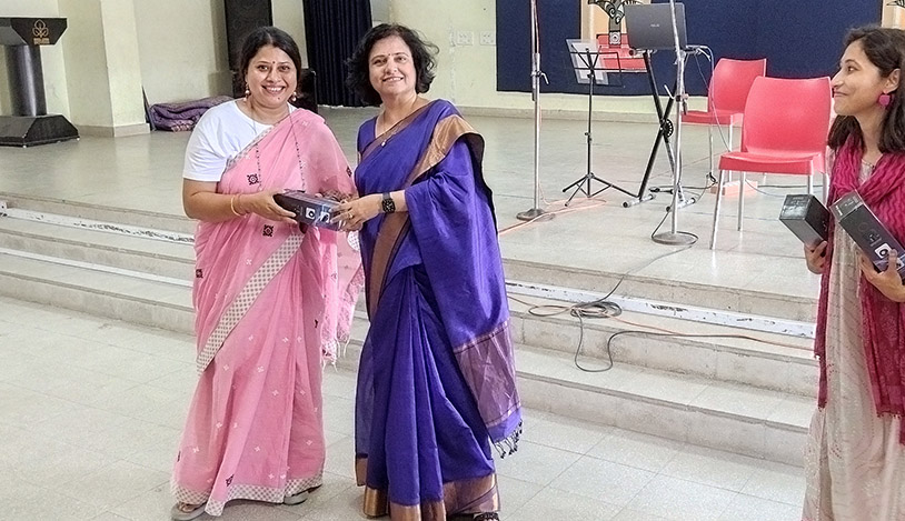 Receiving token of love from NES Management